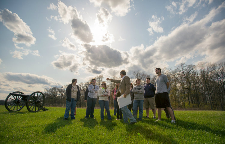 Students tour the battlefield with Prof. Peter Carmichael.